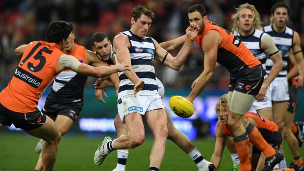Close finish: The Giants drew with Geelong after a missed kick after the siren.