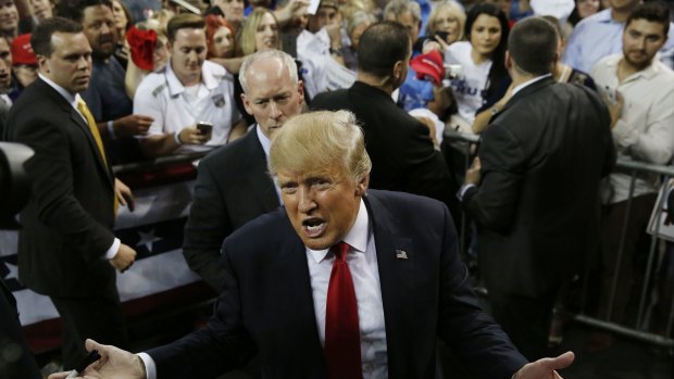 Republican presidential candidate Donald Trump talking to the media after a campaign rally in Orlando, Florida. 