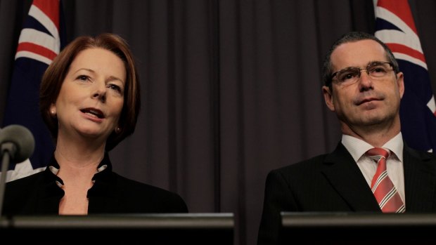 Former prime minister Julia Gillard and then communications minister Stephen Conroyin 2012. 