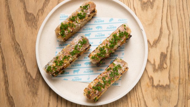 Lardo and anchovy toasts. 