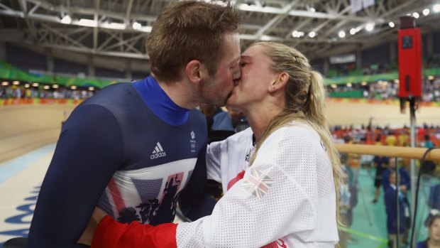 Gold medalist Jason Kenny of Great Britain celebrates with girlfriend, cycling gold medalist Laura Trott of Great Britain.