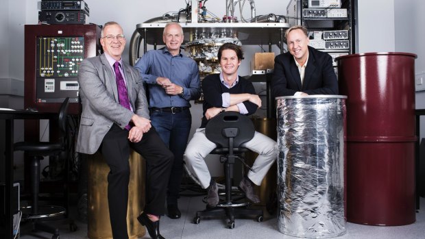 University of Sydney Vice Chancellor Michael Spence with Douglas Carmean and David Reilly and David Pritchard from Microsoft at the University of Sydney's Nanoscience lab. 