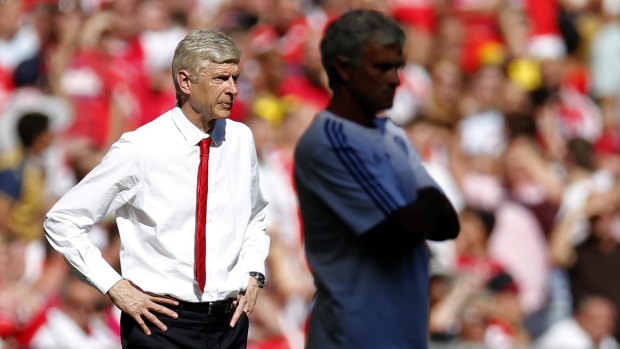 Top gun: Arsene Wenger (left) earned his first win over a Chelsea side that's managed by Jose Mourinho.