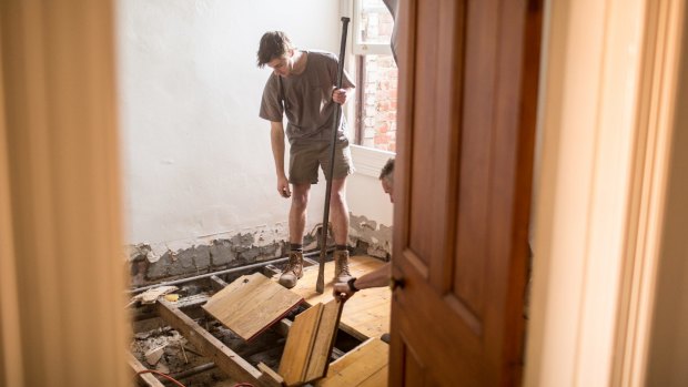 A householder takes drastic action to combat a termite infestation.