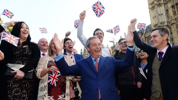 Nigel Farage and his supporters celebrate their victory in the EU referendum. 