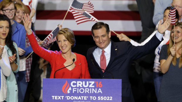 Republican presidential candidate Senator Ted Cruz is joined by former Hewlett-Packard chief executive Carly Fiorina during a rally in Indianapolis.