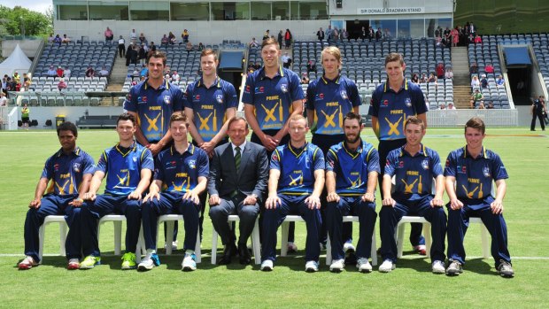 Tony Abbott joins a team photograph with the PM's XI team ahead of January's match. The 2015-16 summer match has been brought forward to October.