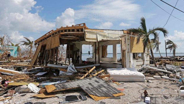 Debris surrounds a destroyed structure in the aftermath of Hurricane Irma.
