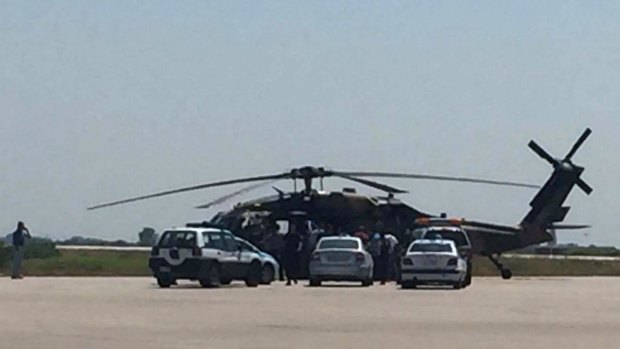 A Blackhawk military helicopter carrying seven Turkish military personnel and one civilian at the Alexandroupolis airport in northeastern Greece. The eight occupants asked for asylum, according to Greece's defence ministry.