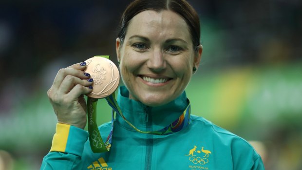 Bronze medalist Anna Meares of Australia celebrates on the podium.