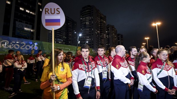 Team Russia athletes attend their welcome ceremony at the Athletes village in Rio on Wednesday.