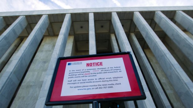 A closure sign stands outside of the Library of Congress in Washington on Saturday.