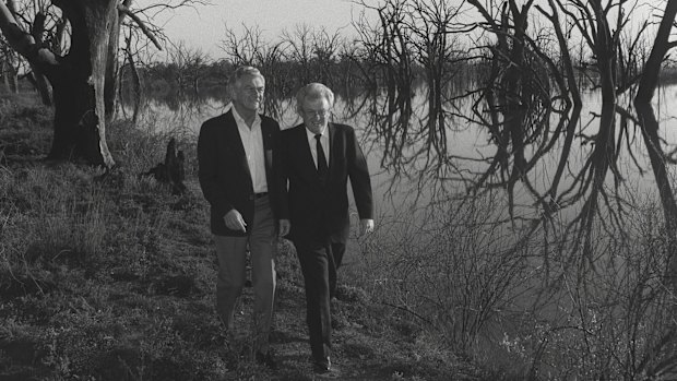 Winning formula: Bob Hawke and Graham Richardson walk among dead box trees at Disher Creek in Renmark South Australia.