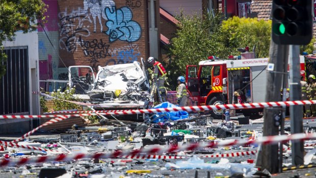 Wreckage after the collision between a truck and several cars in Footscray. 