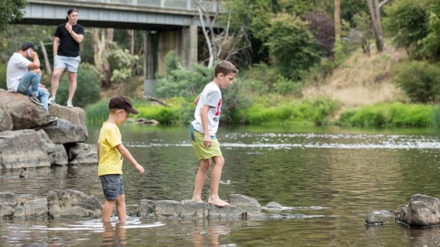 William and Samuel Egan, of Ferntree Gully, enjoy the Yarra River at Warrandyte Bridge