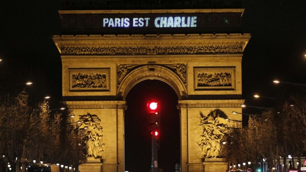 The message: "Paris is Charlie" is projected on the Arc de Triomphe in tribute to the victims of the deadly attacks that rocked France.