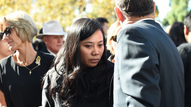 Febyanti Herewila with family and friends at the funeral for her late husband, Bali nine ringleader and drug smuggler Andrew Chan.