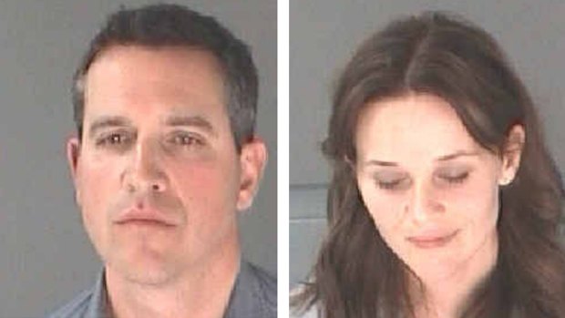 Actor Reese Witherspoon and her husband James Toth after their arrest in 2013.