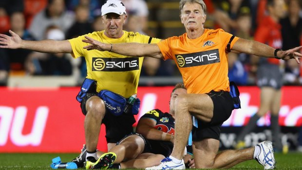 It's bad: Trainers call for a stretcher after Matt Moylan of the Panthers is injured.