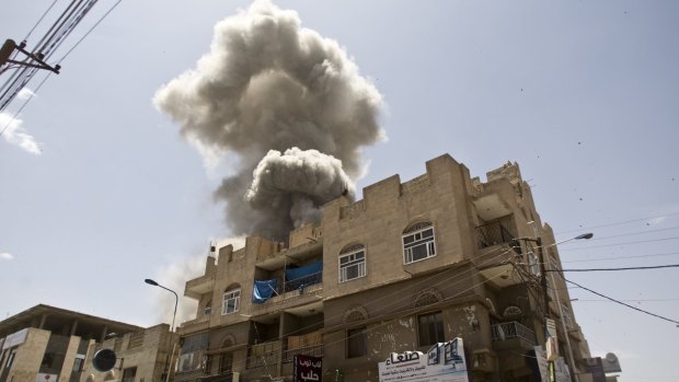 Smoke rises from a house of former Yemeni president Ali Abdullah Saleh after a Saudi-led airstrike in Sanaa, Yemen.