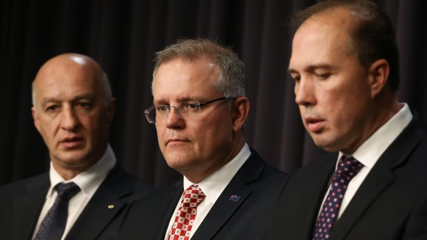 Refugee advocate Paris Aristotle, Treasurer and former immigration minister Scott Morrison, and Immigration Minister Peter Dutton