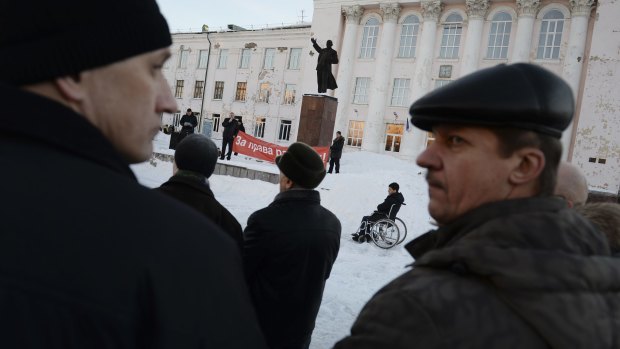 People attend a workers rights protest in the factory town of Nizhny Tagil, Russia. 