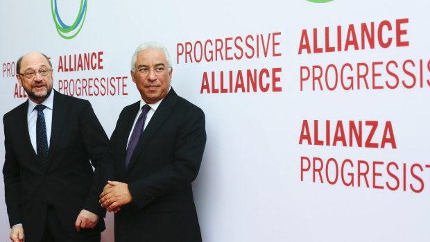 Designated Social Democratic Party chairman Martin Schulz, left, welcomes Portuguese Prime Minister Antonio Costa for the second day of the Progressive Alliance.
