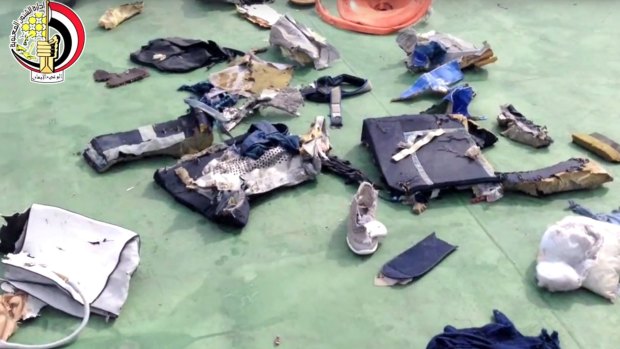 Debris and personal belongings from MS804, including a shoe, which were recovered from the sea.