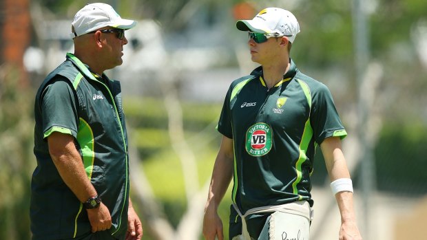 Having a word: Australia coach Darren Lehmann, left, speaks with captain Steve Smith at training in Brisbane.