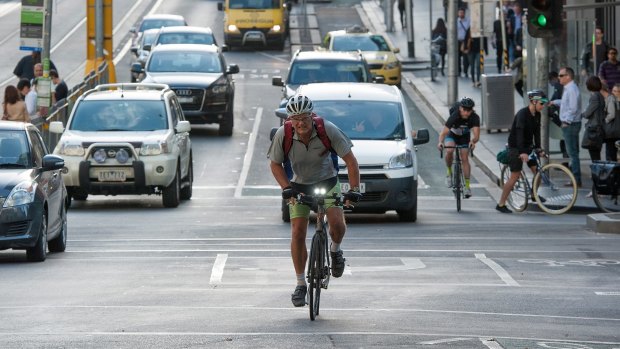 A cyclists uses the La Trobe Street bike lane.