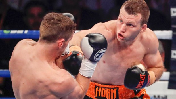 Big hit: Jeff Horn retains his world title against Gary Corcoran in Brisbane.