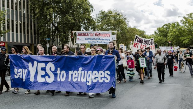 Supporters of refugees rally in Canberra.