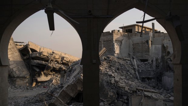 Destroyed buildings in the Old City of Mosul, Iraq. A French woman captured in Mosul with her four small children is facing possible prosecution in Iraq for collaborating with the Islamic State group.