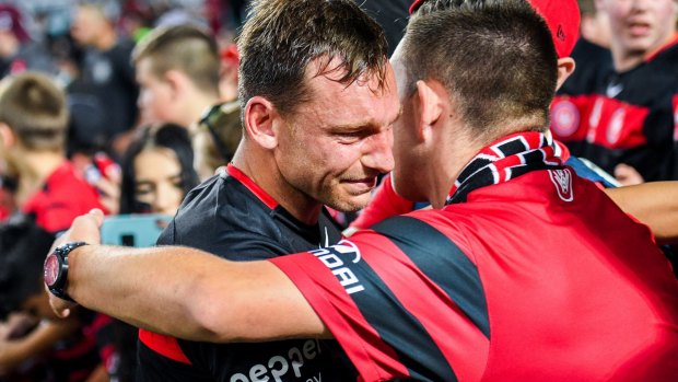Tough to take: Wanderers striker Brendon Santalab in tears after their 5-0 derby defeat to Sydney FC.