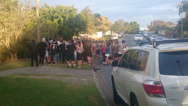 About 100 people hav gatherd in a vigil for Tara Brown at Molendinar on the Gold Coast.
