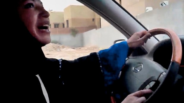 June 2011: a Saudi Arabian woman drives a car in the capital Riyadh in defiance of the kingdom's prohibition.