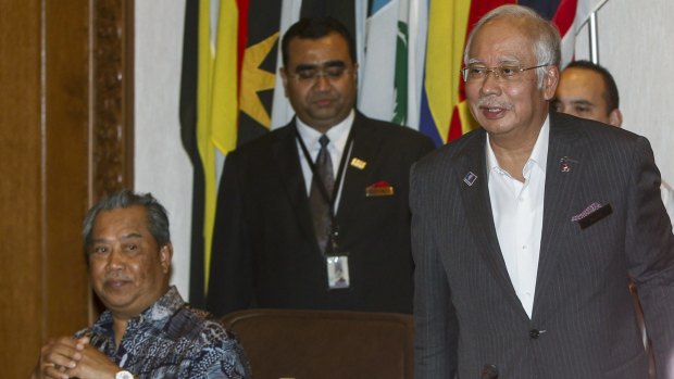 Malaysian Prime Minister Najib Razak, right, at the United Malays National Organisation (UMNO) supreme council meeting in Kuala Lumpur, earlier this month. 