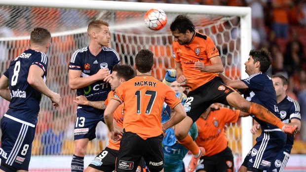 Heading home: Brisbane's Thomas Broich scores the goal that sent defending champions Melbourne Victory tumbling out of the finals race.