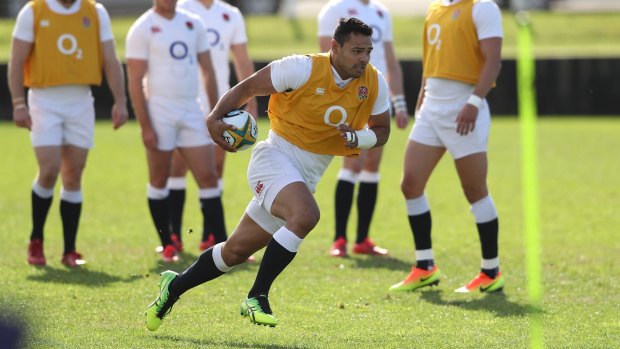Ben Te'o runs with the ball during the England training session held at the Coogee Oval back in June.