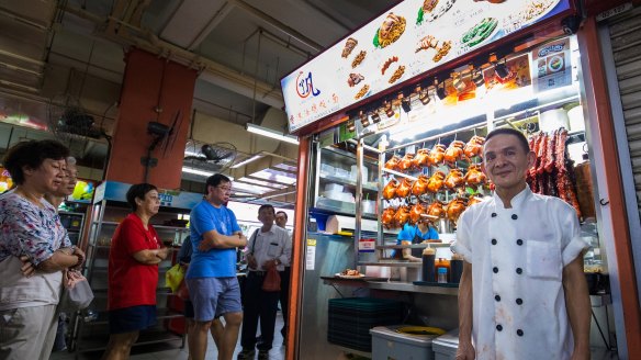 Chan Hon Meng at his stall in Singapore.