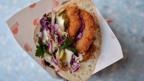 'Pitzi' pezzo filled with schnitzel, Italian slaw and pickles.
