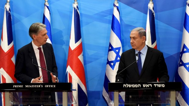British Foreign Secretary Philip Hammond (left) and Israeli Prime Minister Benjamin Netanyahu face the media - and each other - in Jerusalem.