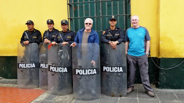 Ken Guider (right) and Max Little (middle) with some friendly police in Lima, Peru.
