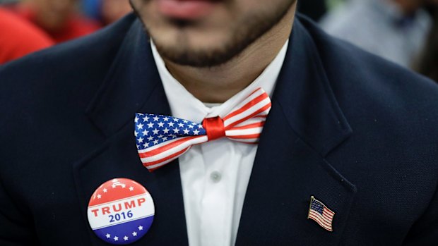 A supporter waits for Republican presidential candidate Donald Trump to speak at a rally in Pennsylvania.