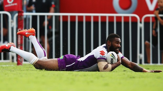 Storming: Marika Koroibete of the Melbourne Storm scores the winning try.