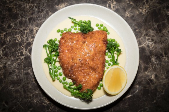 Chicken cotoletta, peas, broccolini and lemon parmesan cream.