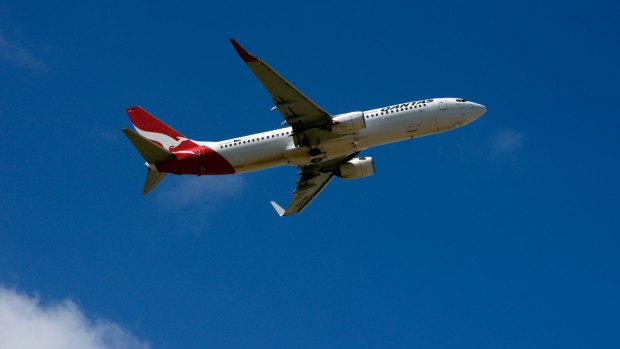 Flying high, in the sky ... global airlines including Qantas will be boosted by lower costs for jet fuel.
