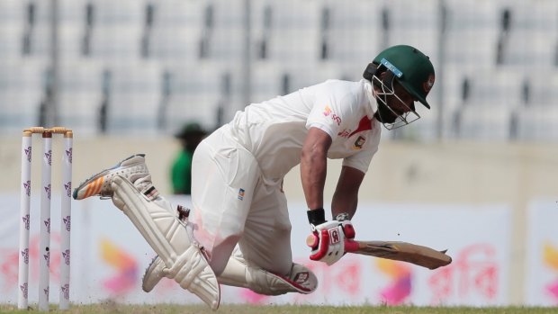 Full pitch: Bangladesh's Tamim Iqbal at the crease on day one of the first test in Dhaka.