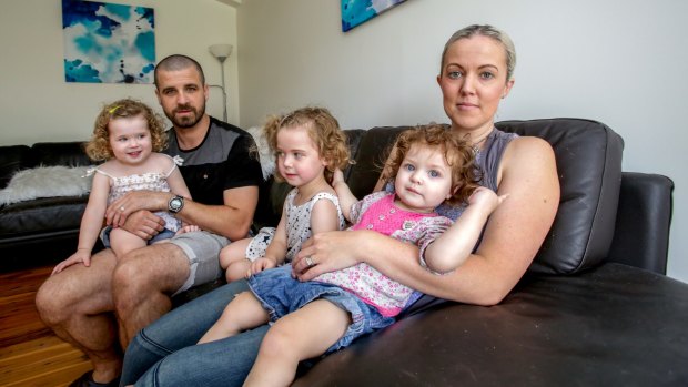 Alisha and Patrick Hannah, with their daughters Chloe, 5, Ava, 2, and Ruby, 1, are concerned about the rising cost of private health insurance.