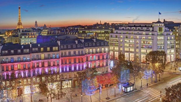 Champs Elysees in Paris lights up at Christmas.
